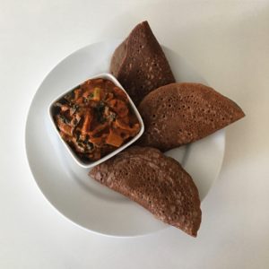 Ethiopian peanut stew with injera